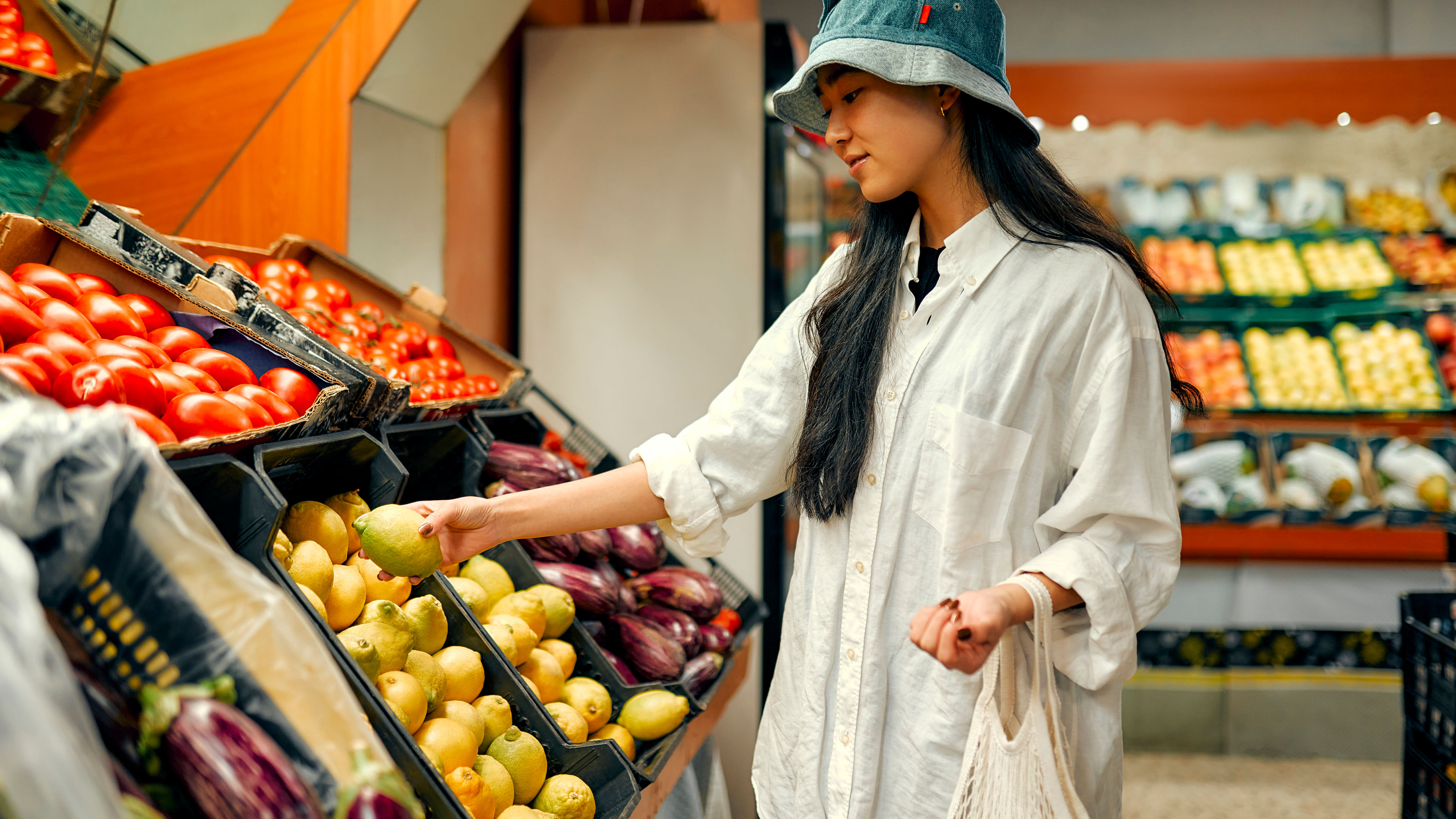 A woman at a grocery store. 