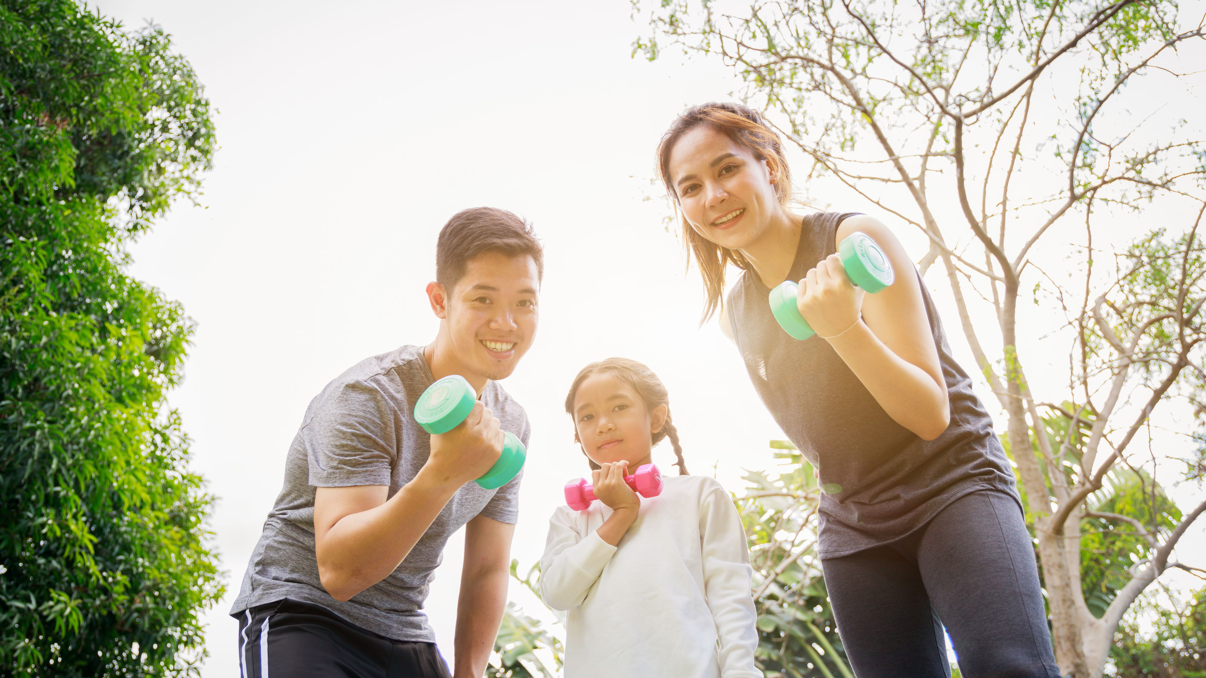 asian family exercising