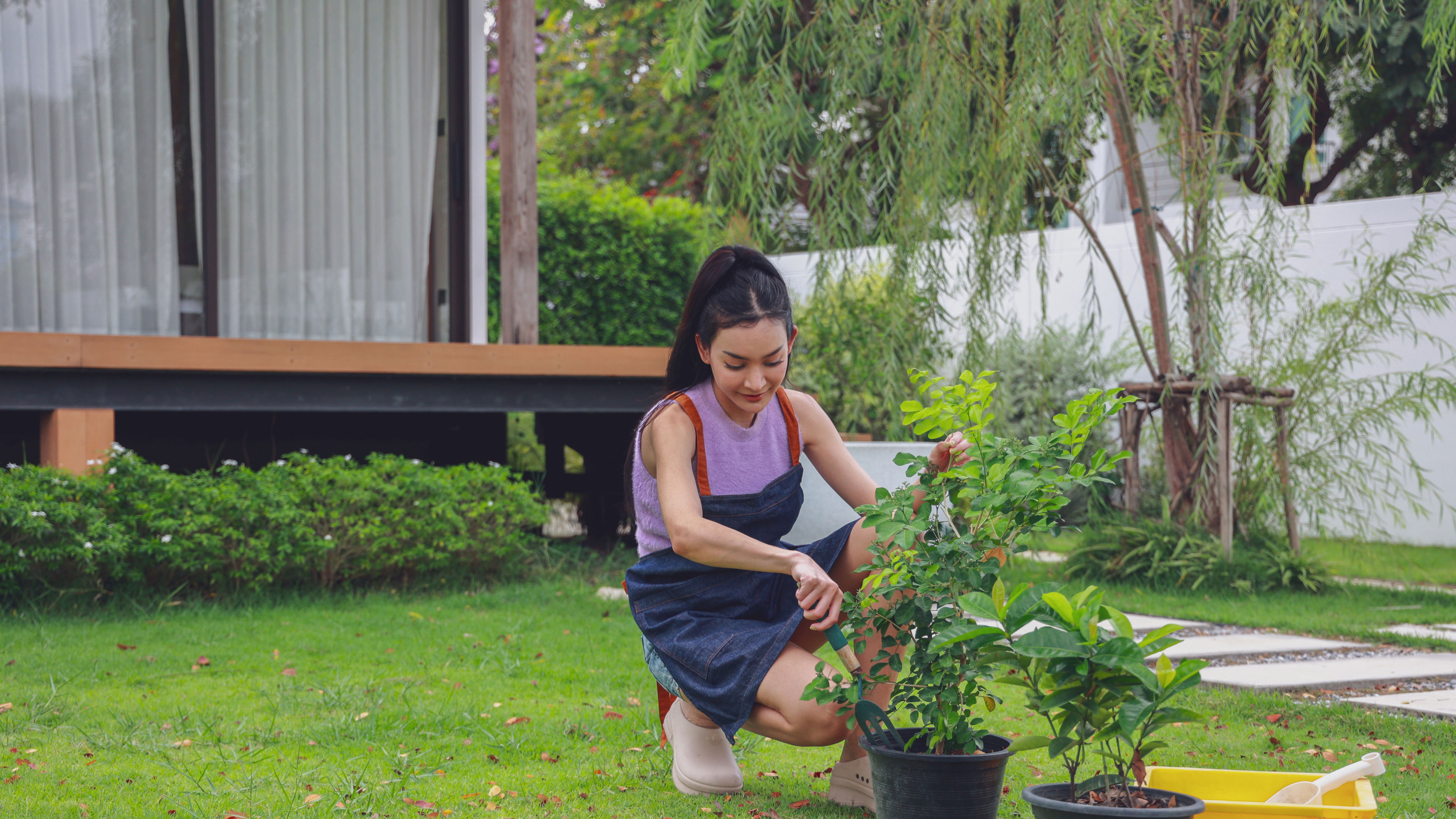 Smiling woman gardening