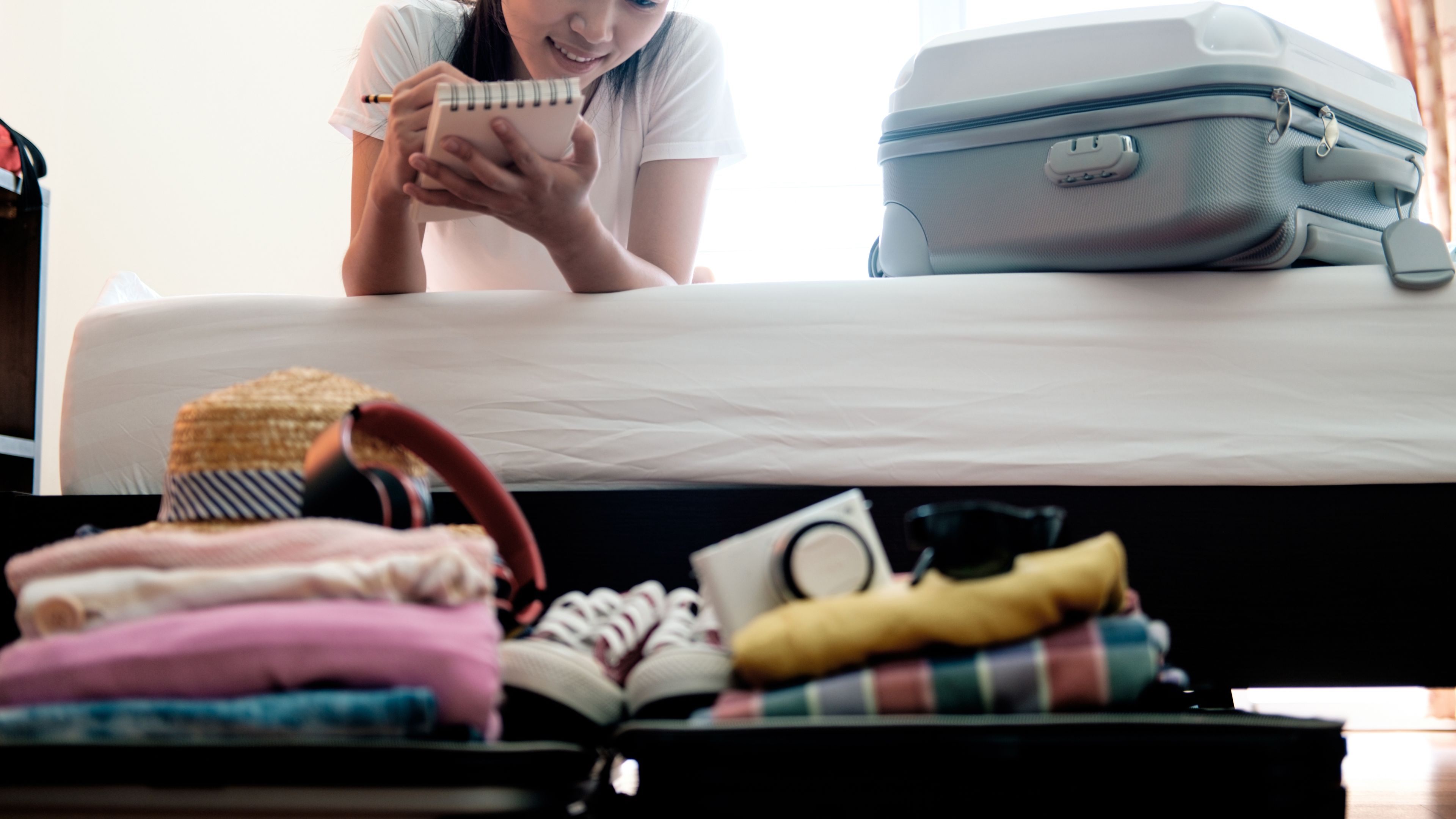 Woman packing for a vacation