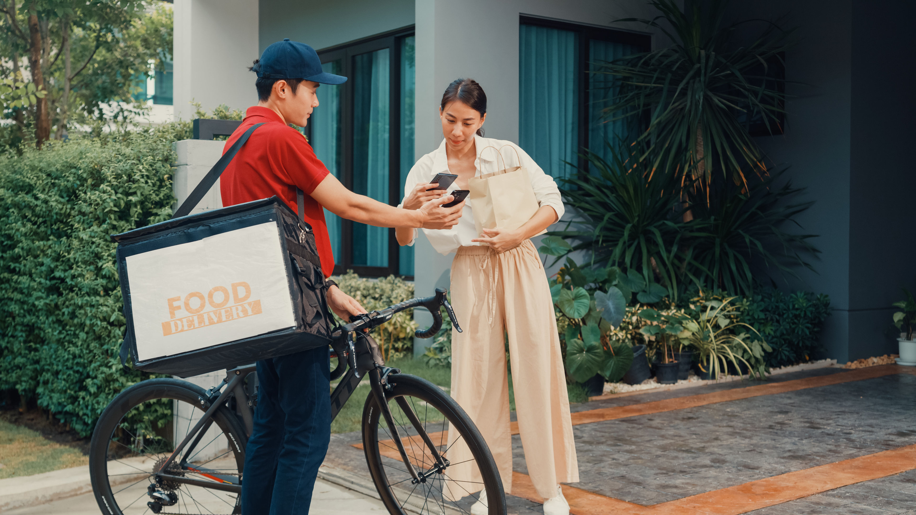 Woman receiving food delivery