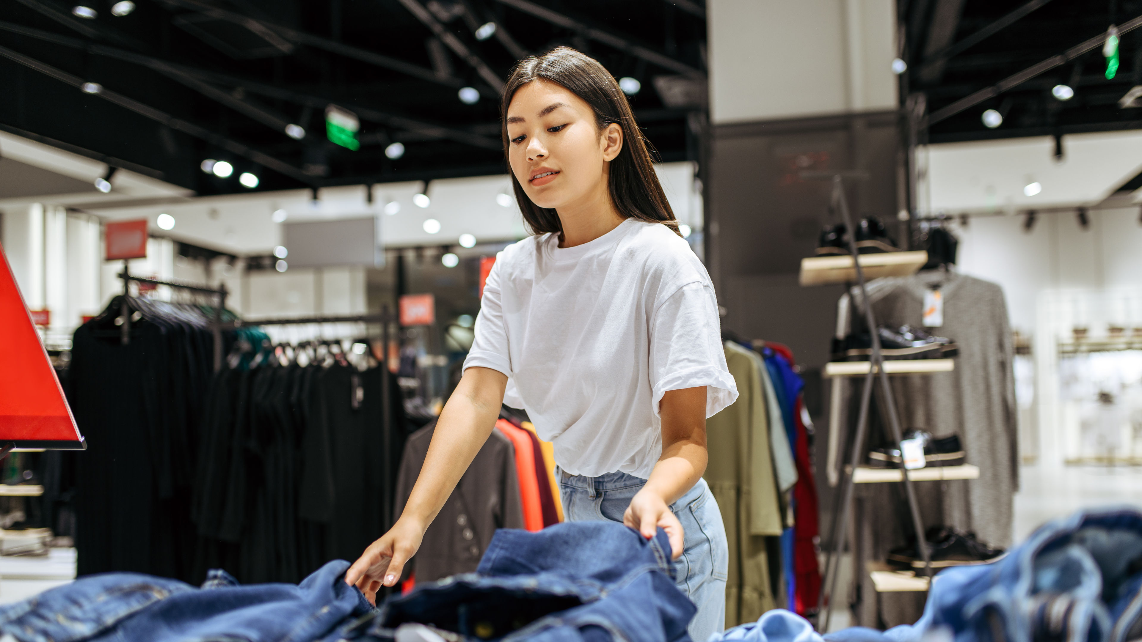 Woman shopping for denim shorts